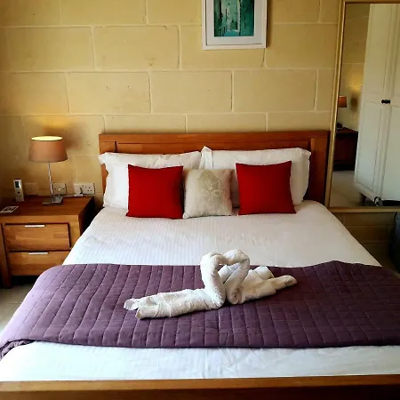 Townhouse Boutique Couette-café Għarb